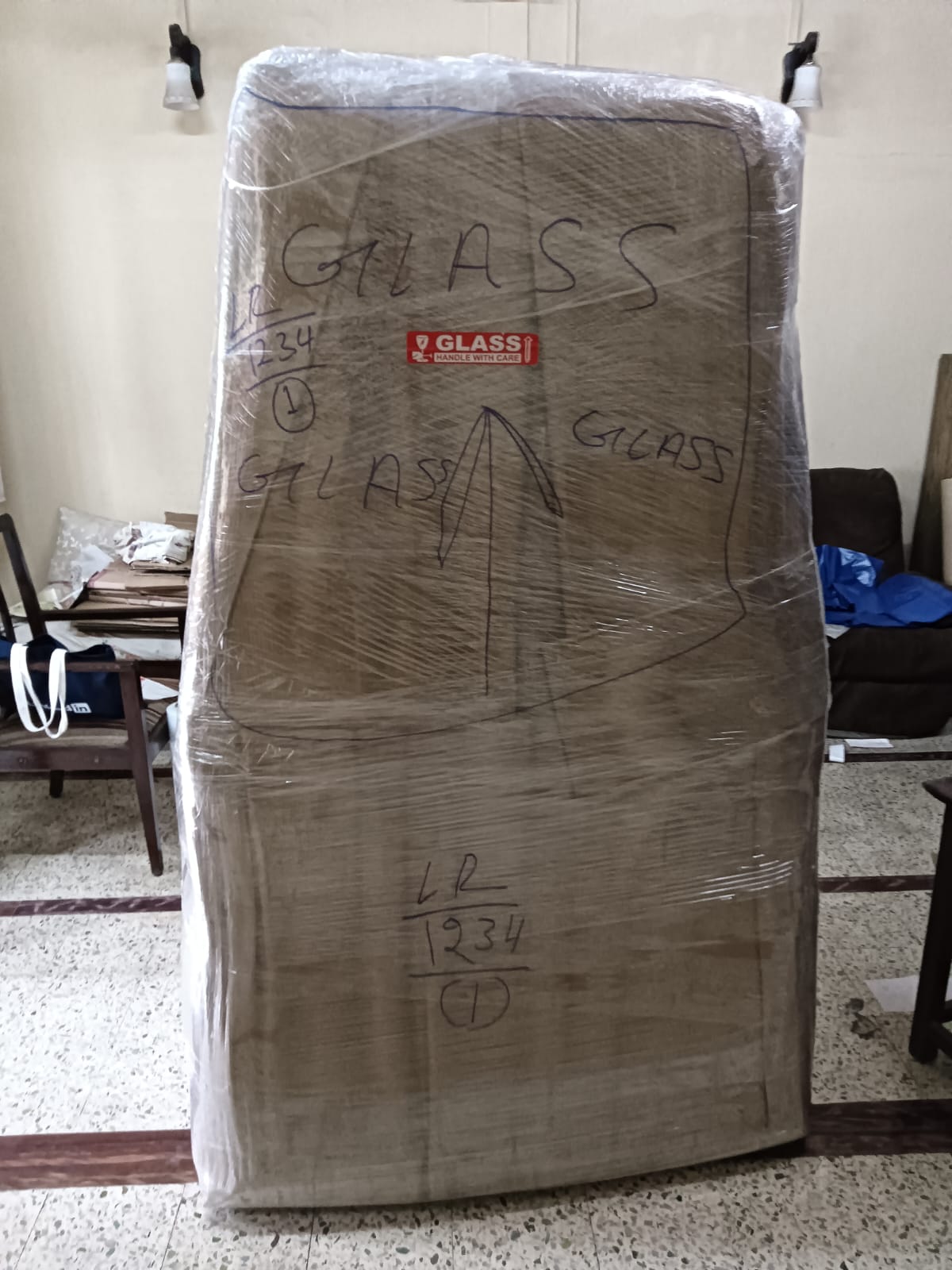 Fragile glass item packed and marked handle with care by packers and movers in Ghatkopar