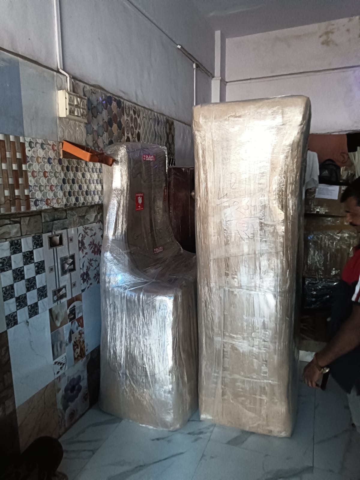 Fridge and mattress wrapped and ready to move