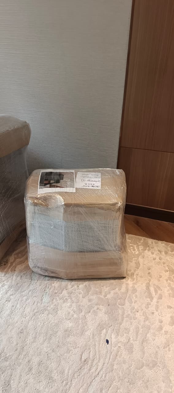 Household furniture wrapped in stretch film before shifting in Ghatkopar